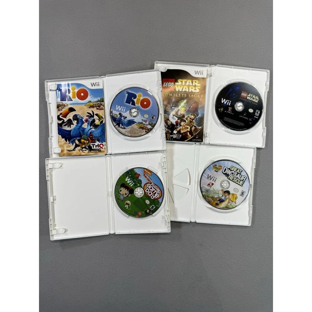 Nintendo Wii Lot of 4 Games w/ Manuals: Rio, LEGO Star Wars Complete Saga